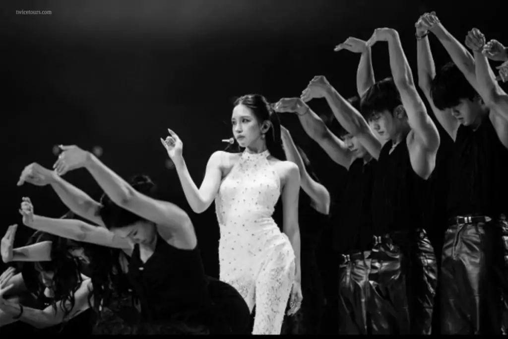 Mina (TWICE): Complete 2026 Guide to Music, Tours & Career 2 Mina Live on stage